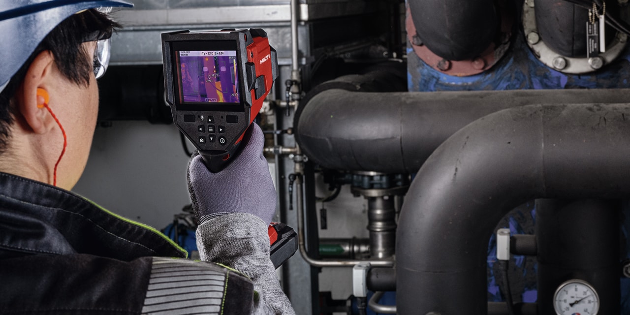 man using Hilti thermal camera