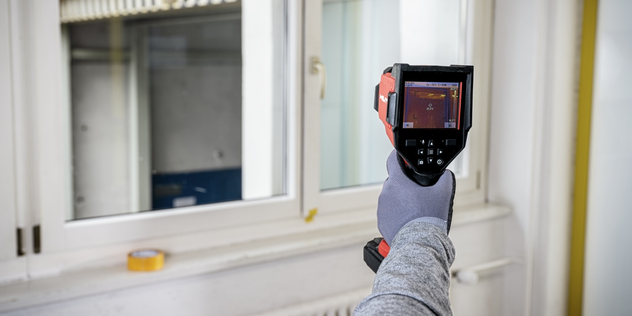 man using Hilti thermal camera